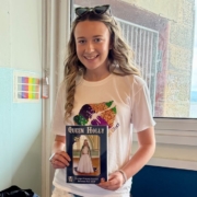 Queen Elect Holly, shown with the 2026 Bo'ness Fair Programme